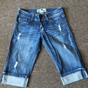 Jolt Jeans distressed knee cut off jeans.